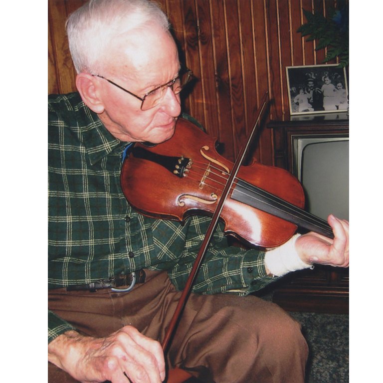 Joe Dawson playing the fiddle